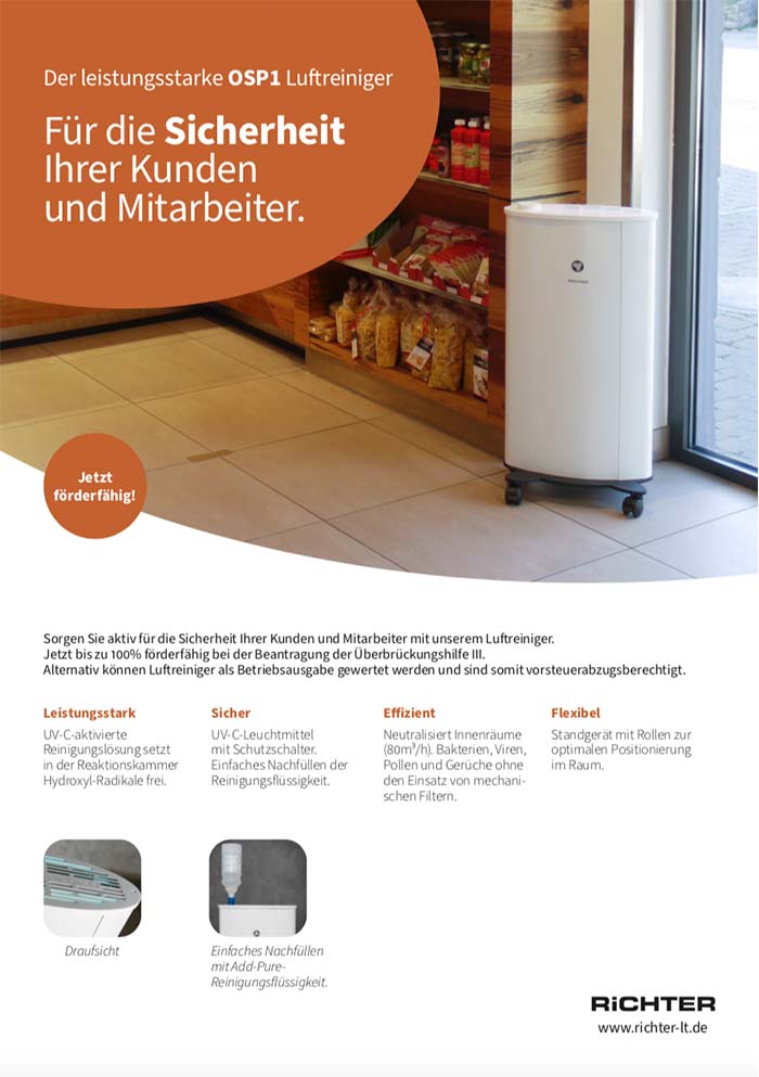 white OSP1 aircleaner in a supermarket next to shelves with food